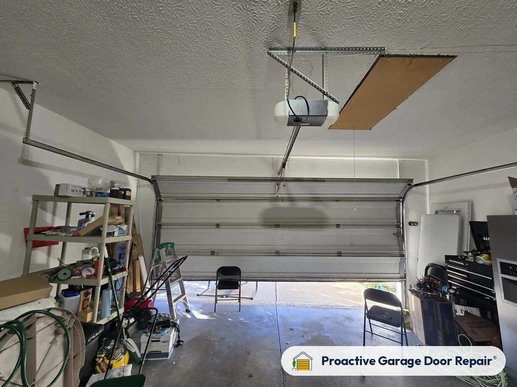 Garage door opener and rail installed by Proactive Garage Door Repair