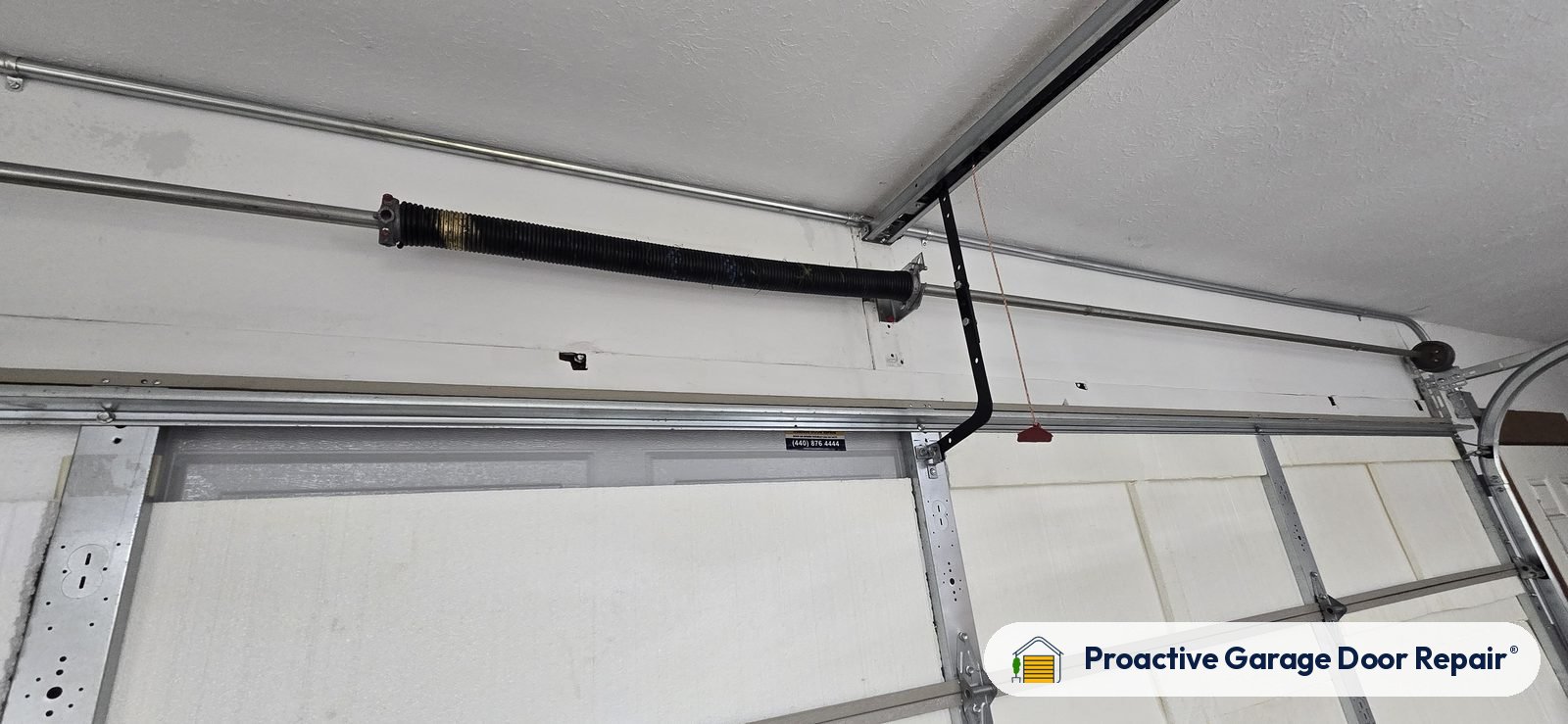 Garage door spring repair by Proactive Garage Door Repair in Strongsville, Ohio