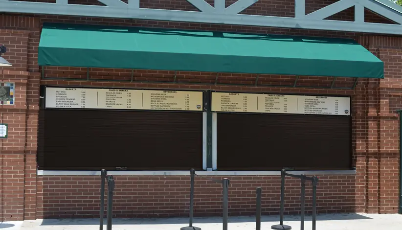 Insulated Rollup Counter Door installed in a window opening of a cafeteria