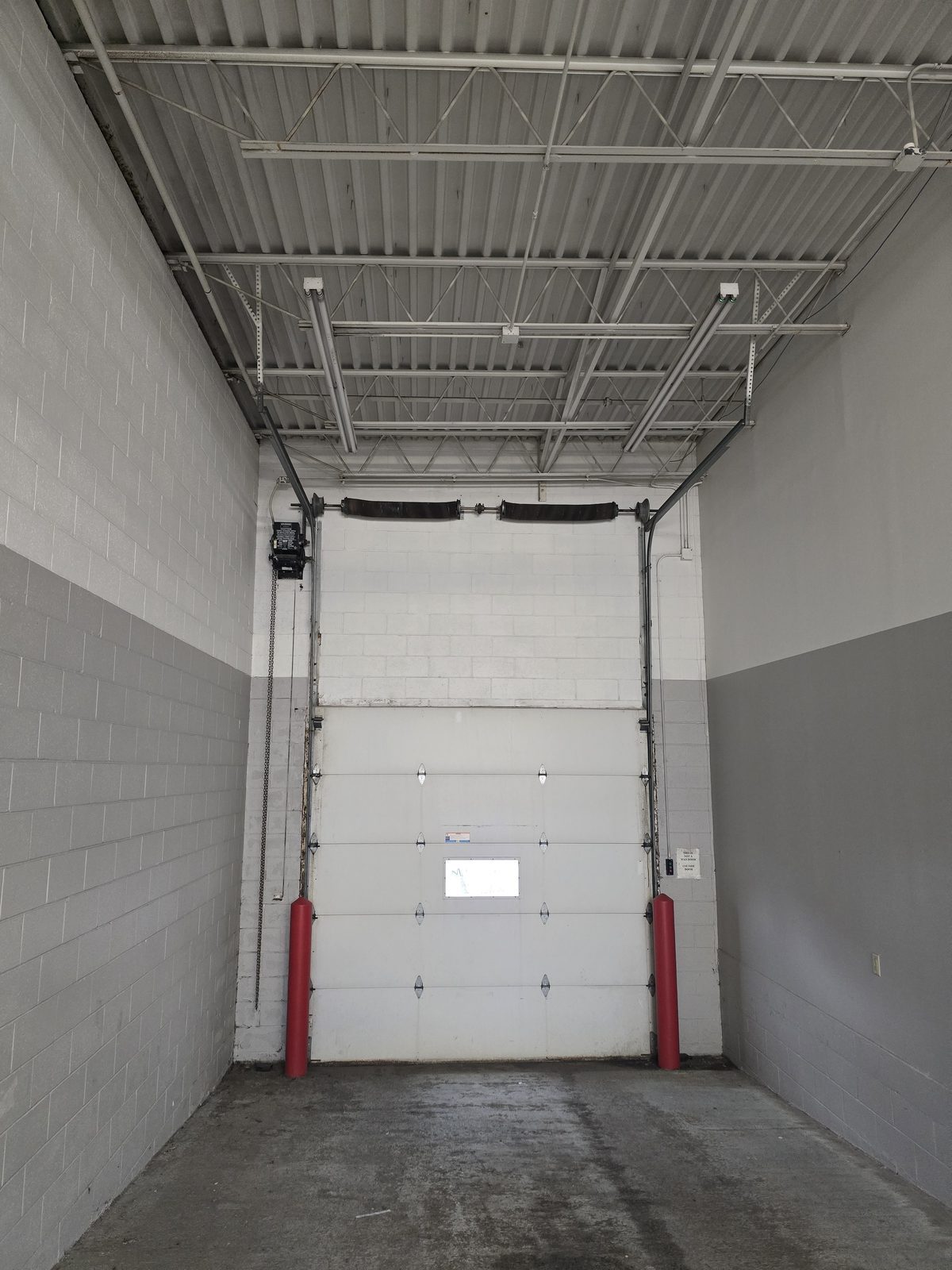 Commercial overhead door serviced by Proactive Garage Door Repair, photo 2