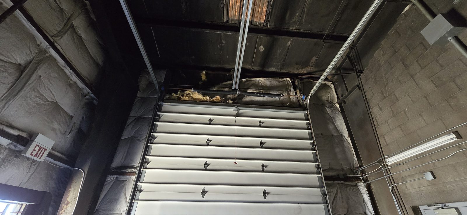 Commercial overhead door serviced by Proactive Garage Door Repair, photo 3
