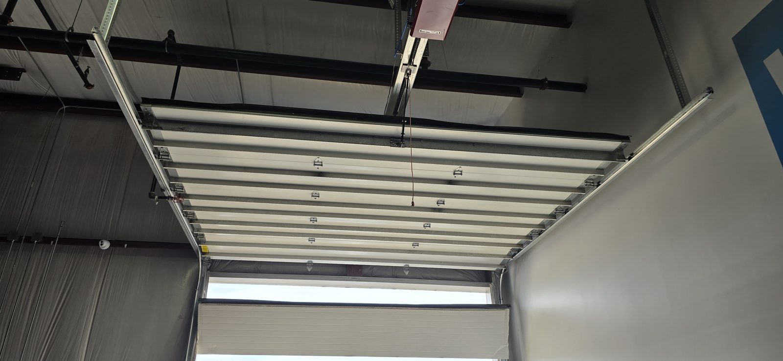 Commercial overhead door serviced by Proactive Garage Door Repair, photo 4
