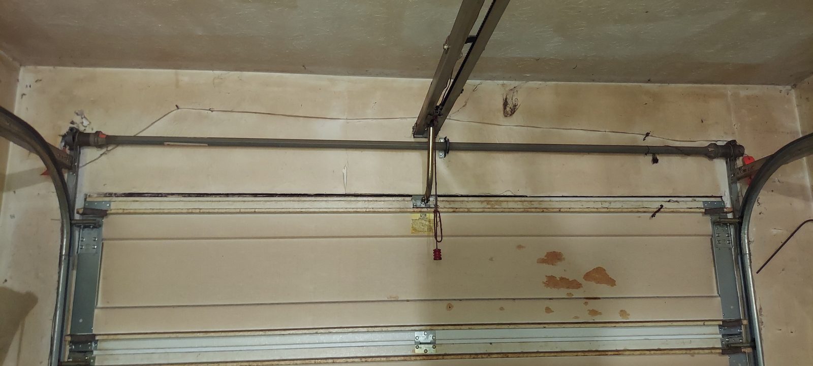 Damaged garage door before repair, photo 5