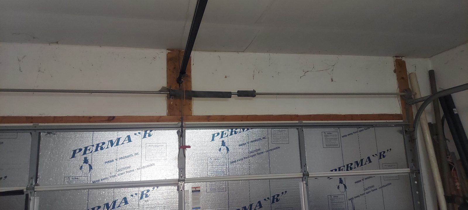 Garage door installation in progress by Proactive Garage Door Repair