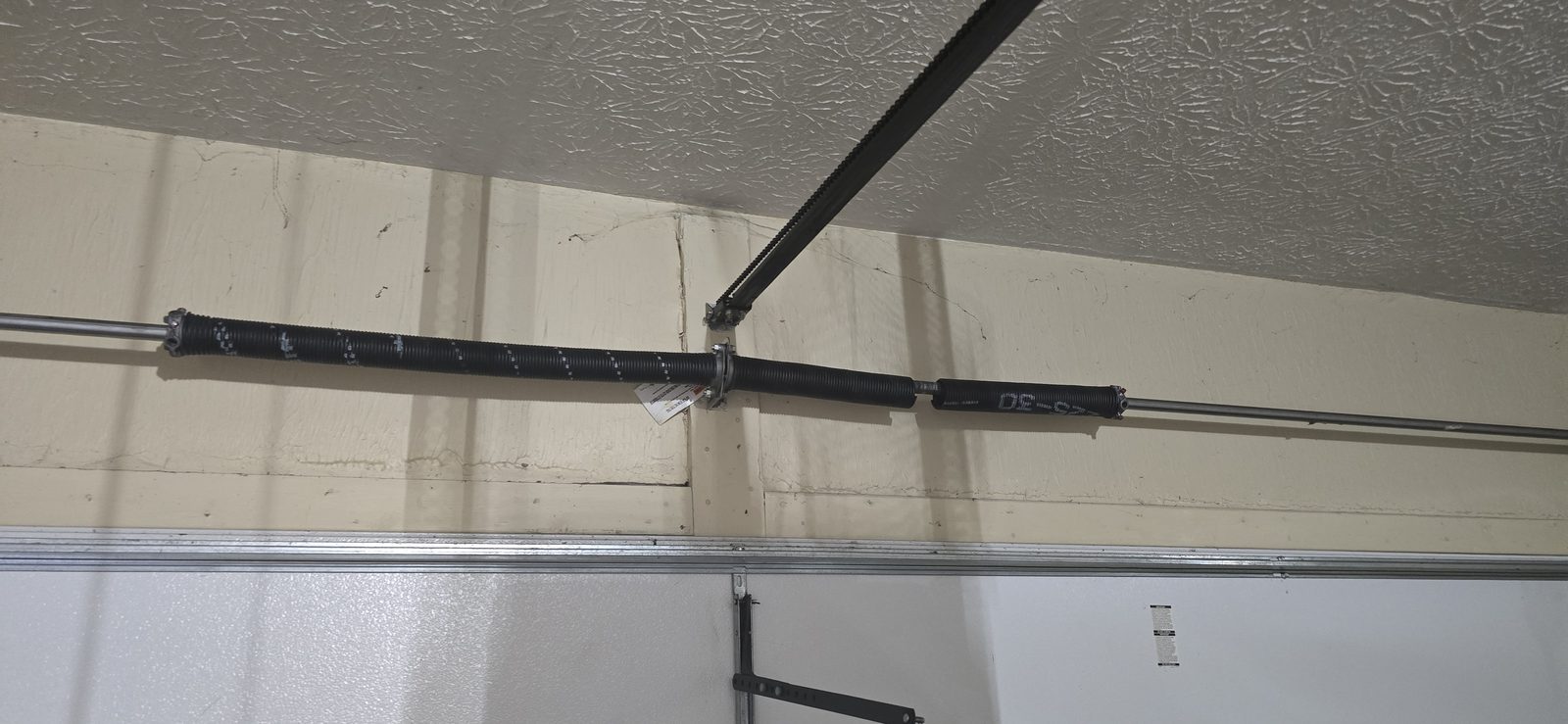 Garage door spring repair by Proactive Garage Door Repair