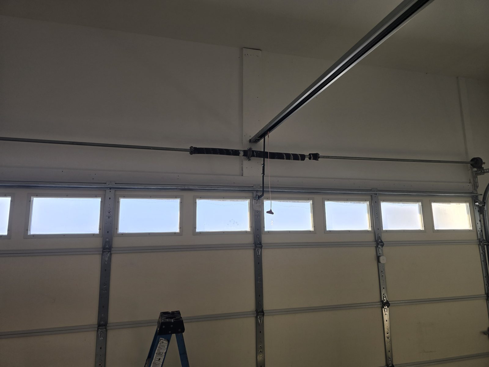 Garage door springs replaced and adjusted by Proactive Garage Door Repair in York Township, Ohio
