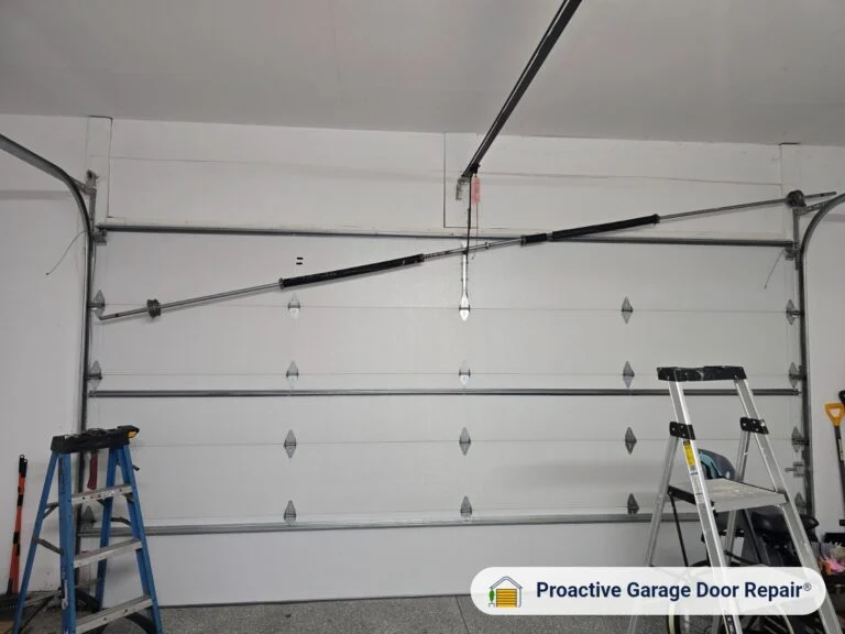Broken garage door torsion spring