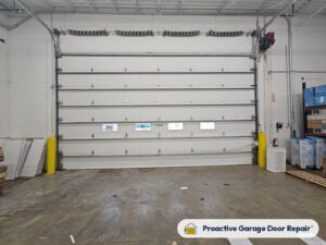 Commercial overhead sectional door serviced by Proactive Garage Door Repair