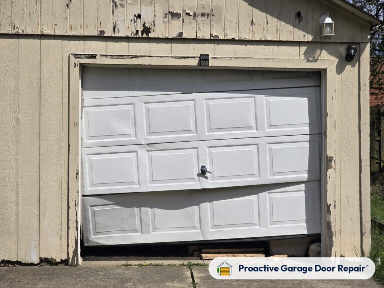 Damaged garage door before repair, photo 4