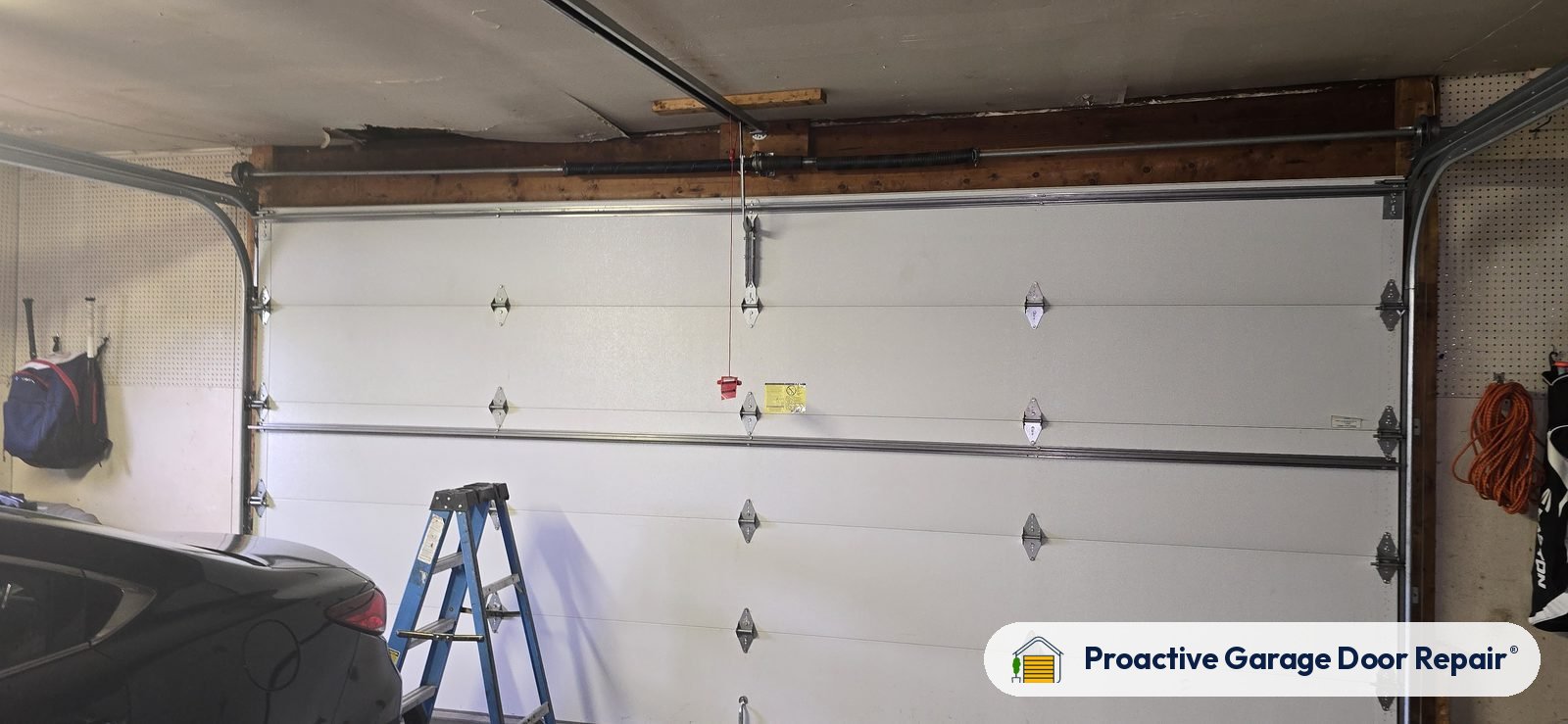 Garage door springs, tracks and hardware serviced by Proactive Garage Door Repair