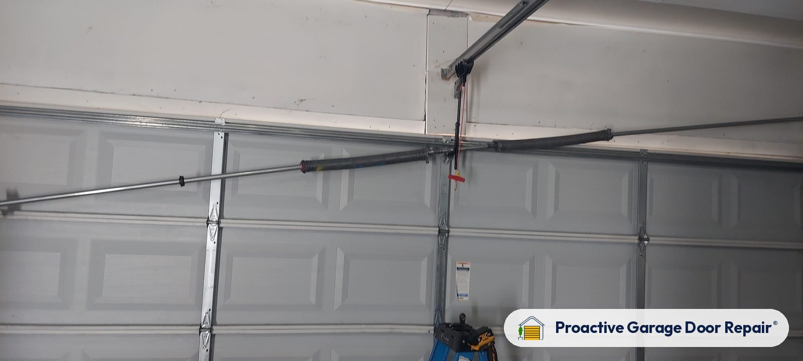 Garage door springs, tracks and hardware serviced by Proactive Garage Door Repair