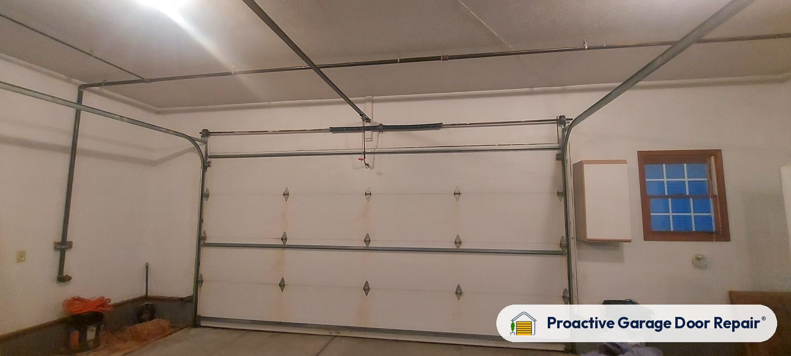Garage door springs, tracks and hardware serviced by Proactive Garage Door Repair, photo 3