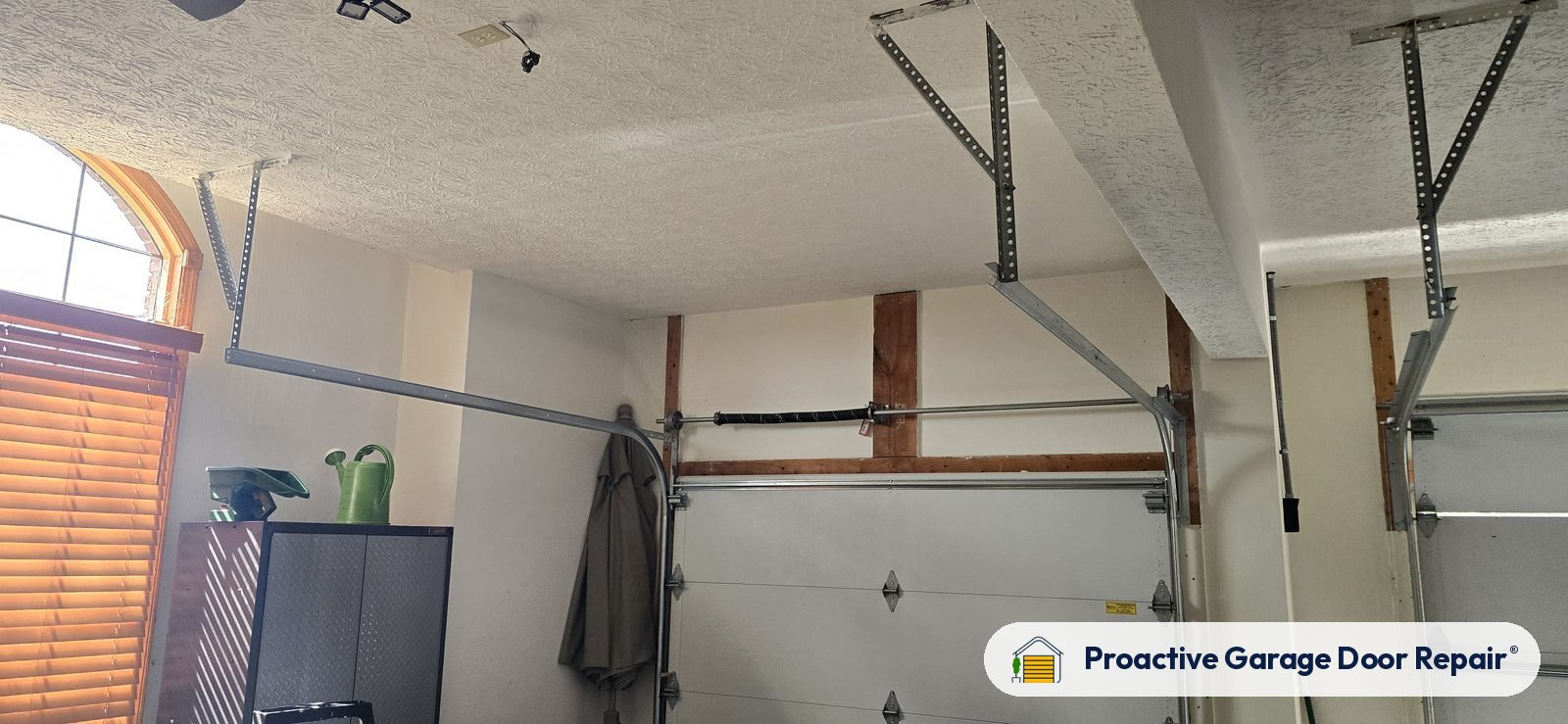 Garage door springs, tracks and hardware serviced by Proactive Garage Door Repair