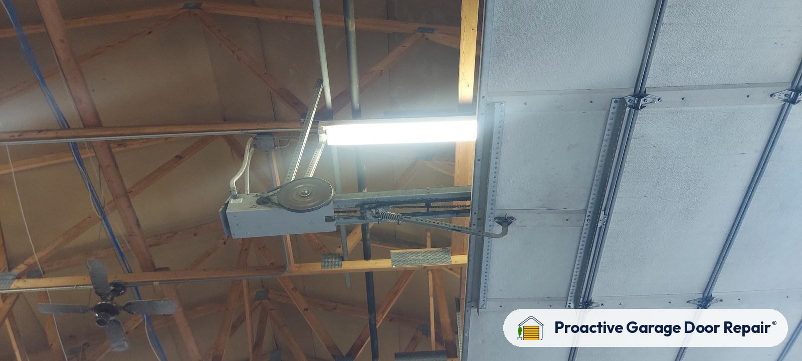 Garage door opener and rail in a customer garage, Proactive Garage Door Repair job