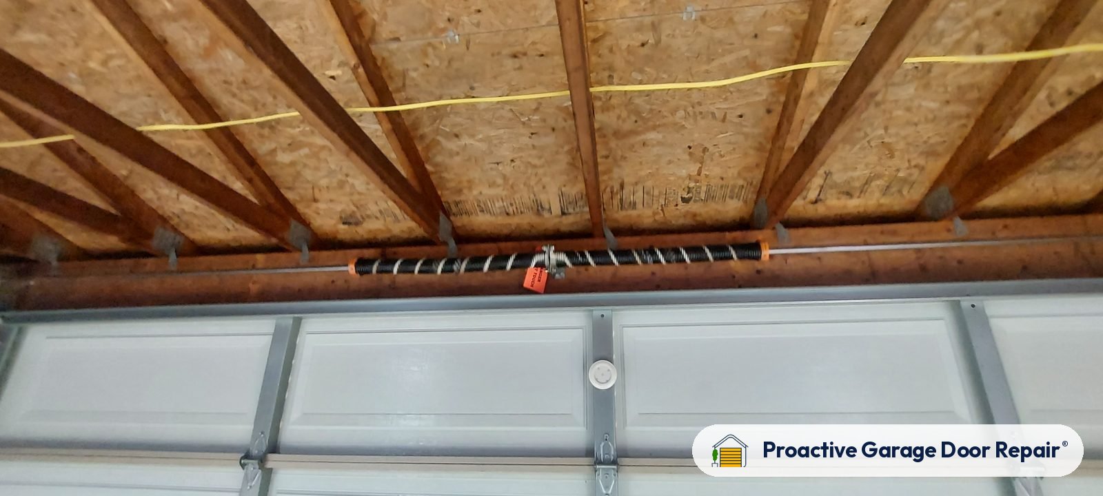 Garage door spring repair by Proactive Garage Door Repair