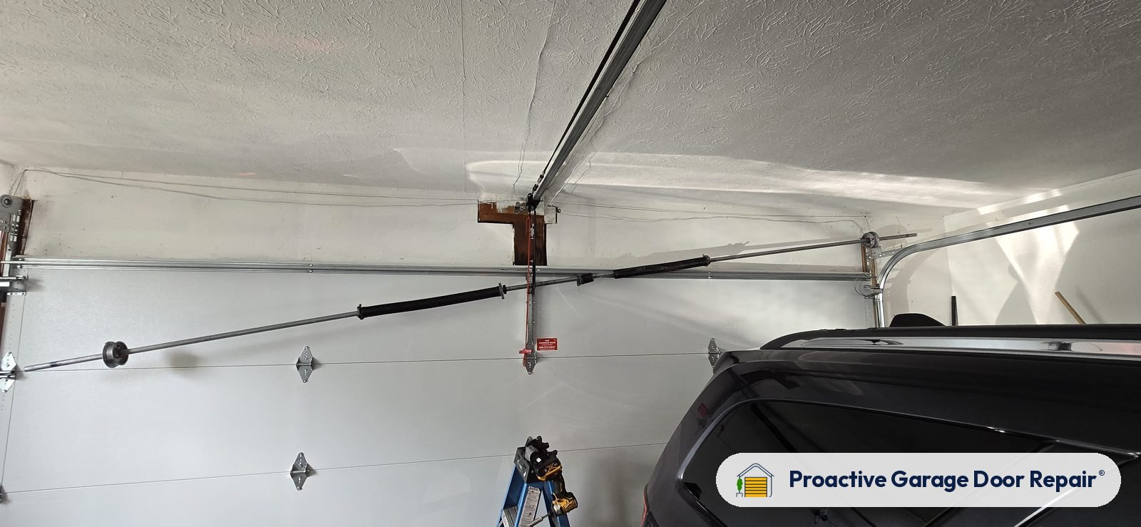 Garage door spring repair by Proactive Garage Door Repair