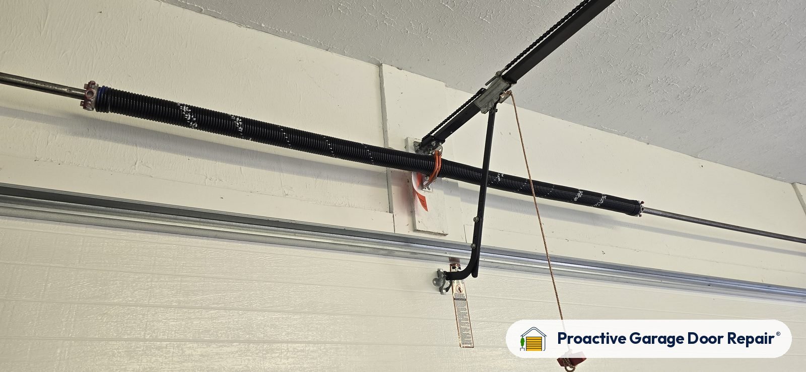 Garage door spring repair by Proactive Garage Door Repair