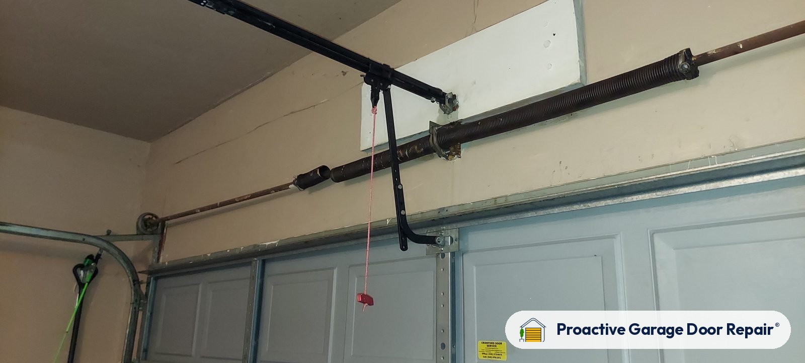 Garage door spring repair by Proactive Garage Door Repair