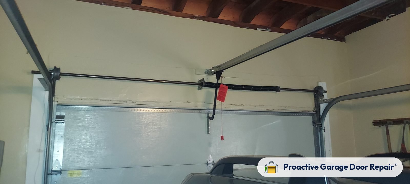 Garage door spring repair by Proactive Garage Door Repair in Louisville, Ohio