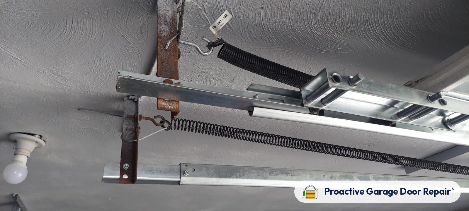 Garage door springs replaced and adjusted by Proactive Garage Door Repair