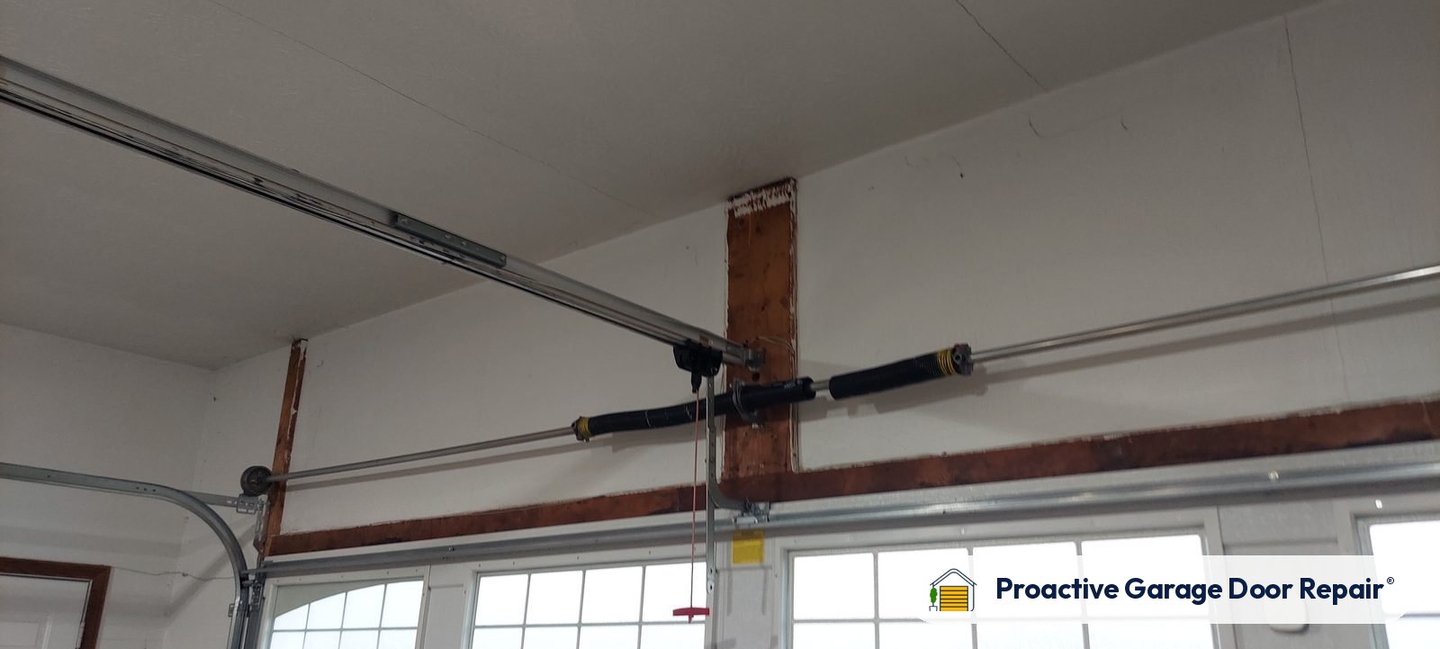 Garage door springs replaced and adjusted by Proactive Garage Door Repair